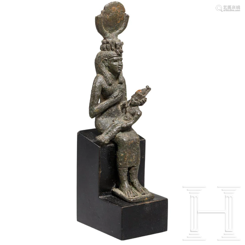 An Egyptian bronze statue of the goddess Isis with