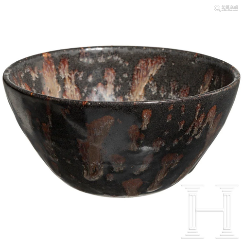 A Chinese tea bowl with spotted decoration, southern