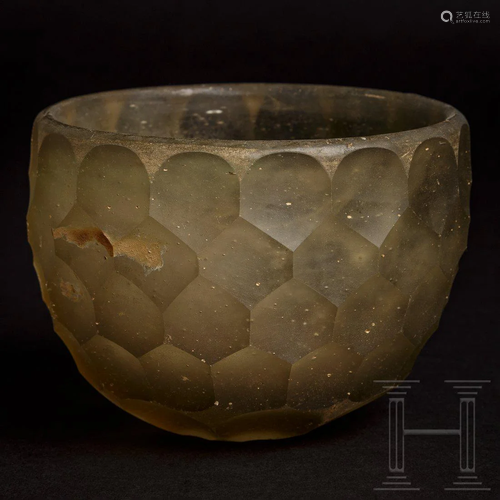 A late Sassanian glass beaker, 5th - 7th century