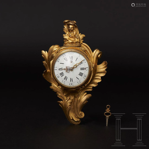 A small Louis XV mantel clock with a pocket watch