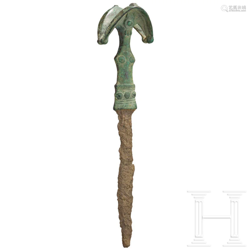 A Luristan iron sword with exceptional bronze hilt, 9th