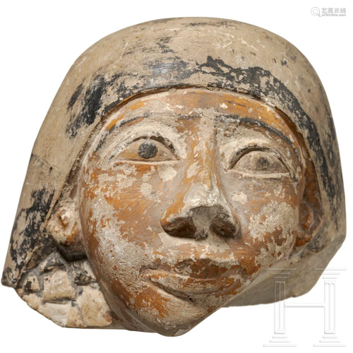 An Egyptian canopic lid, 2nd - 1st millennium B.C.