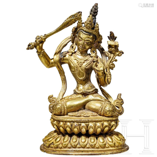 A gilded Tibetan bronze statue of Boddhisattva