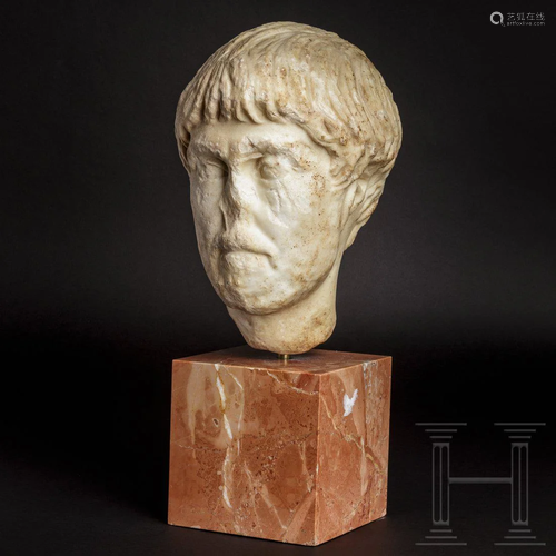 A Roman marble head of a young man, 1st half - mid-2nd