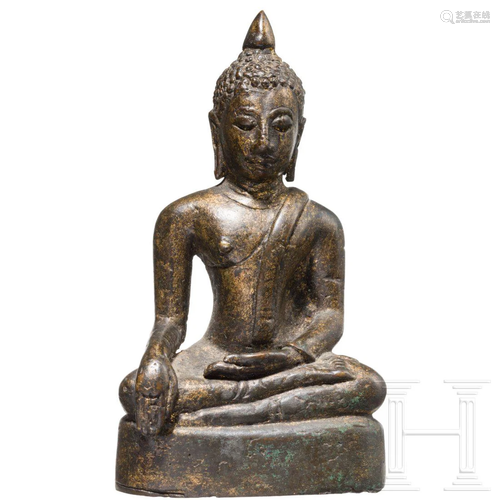 A small Thai sculpture of a sitting Buddha, probably