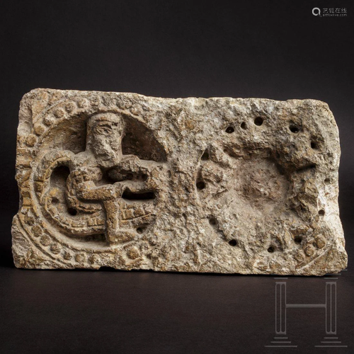 A fragment of a French Romanesque limestone frieze,