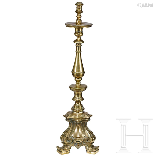 A large Italian brass candlestick, 17th century