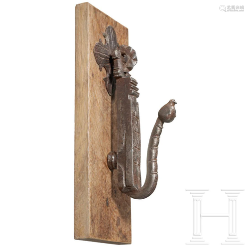 A French wrought-iron doorknocker with animal head