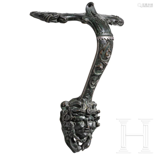 An Italian Renaissance bronze handle in antique style,