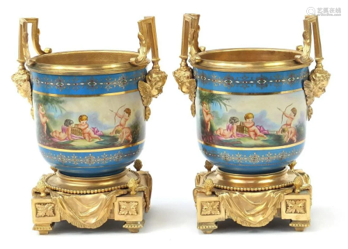 Pair of French gilt bronze mounted porcelain pots in
