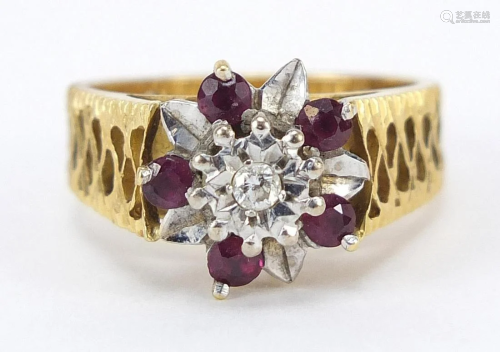 18ct gold diamond and ruby flower head ring, size N,