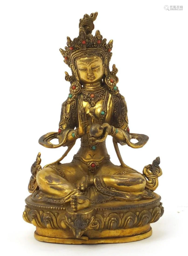 Chino Tibetan patinated bronze jewelled Buddha, 22cm