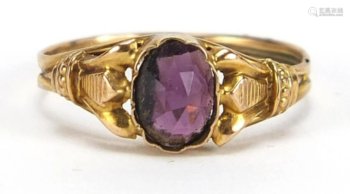 Antique unmarked gold garnet ring with ornate setting,