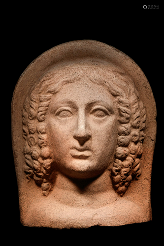 An Etruscan Terracotta Votive Head of a Woman Height 10