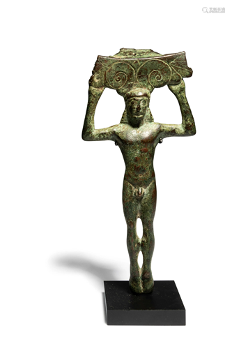 A Greek Bronze Patera Handle, in the shape of a Kouros