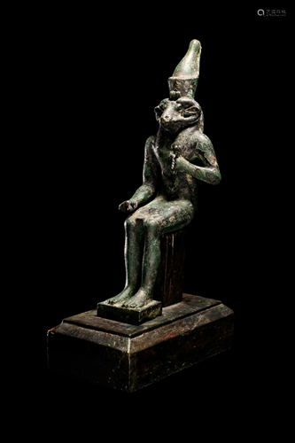 An Egyptian Bronze Khnum Height 8 1/2 inches.