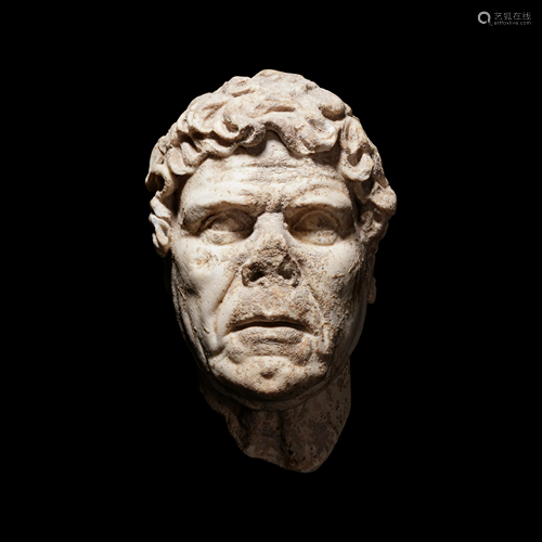 A Hellenistic Marble Portrait Head Height 12 inches.