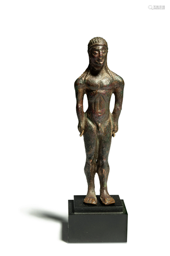 A Greek Bronze Kouros Height 3 1/2 inches.