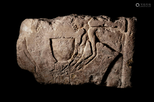 An Egyptian Limestone Relief Fragment Height 9 x