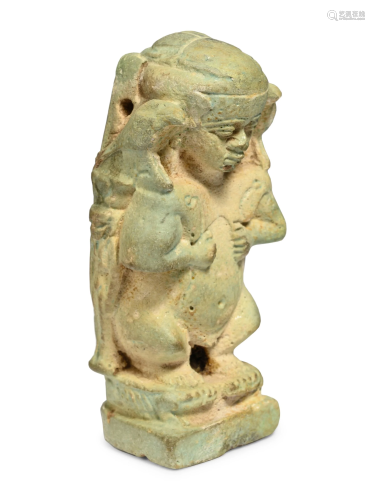 An Egyptian Faience Pataikos Height 2 3/4 inches.