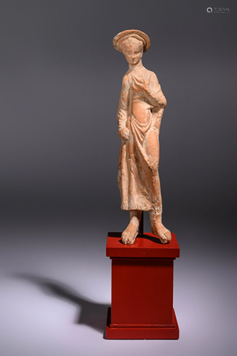 A Greek Terracotta Woman Wearing a Polos (broad-rimmed