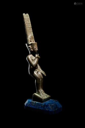 An Egyptian Bronze Harpocrates Height 9 3/4 inches.