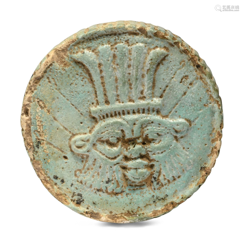 An Egyptian Faience Two-Sided Medallion Height 2