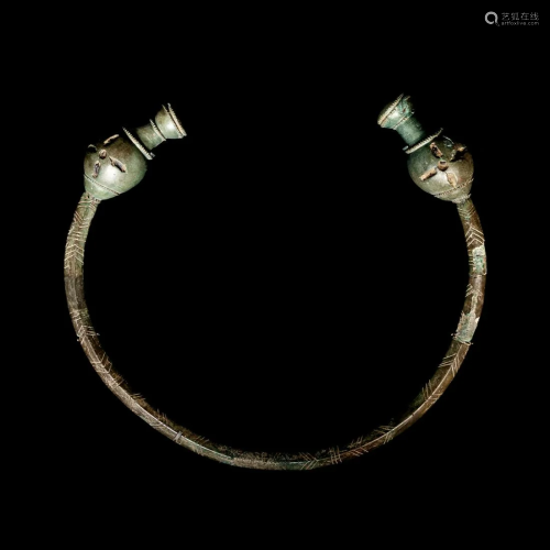 A Celtic Bronze Torc with Poppy-Head Terminals