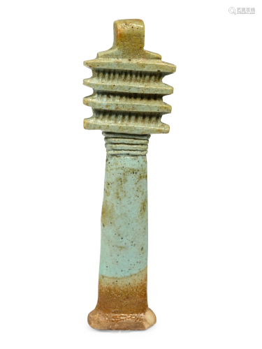 An Egyptian Faience Djed Pillar Height 3 3/4 inches.