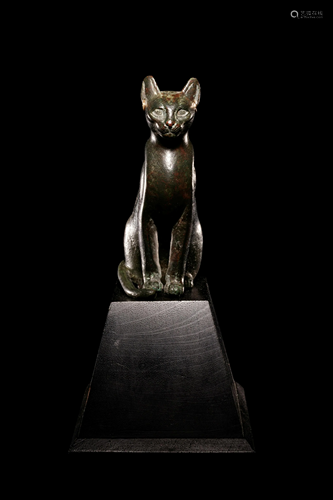 An Egyptian Bronze Cat Height 4 7/8 inches.