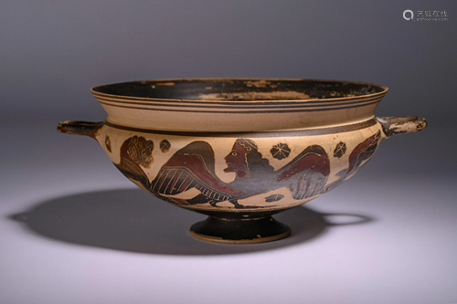 A Corinthian Black-Figured Kylix Height 3 1/2 inches.