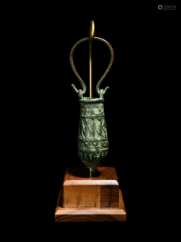 An Egyptian Bronze Situla Height 8 1/4 inches.