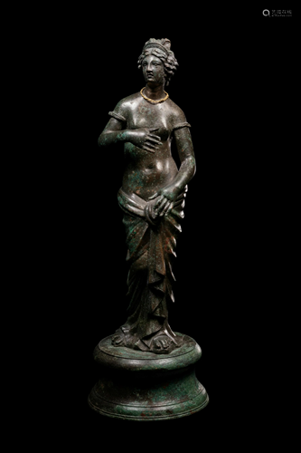 A Roman Bronze Venus Height 8 3/4 inches.