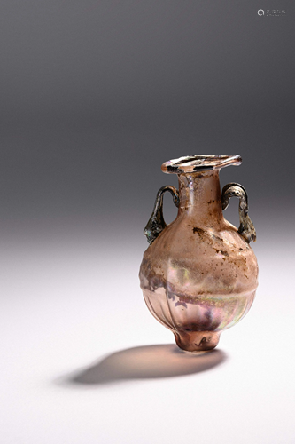 A Sidonian Mold-Blown Aubergine Glass Flask with