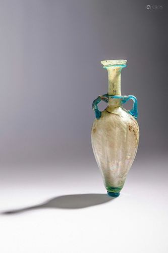 A Roman Glass Flask with Silver Iridescence Height 8