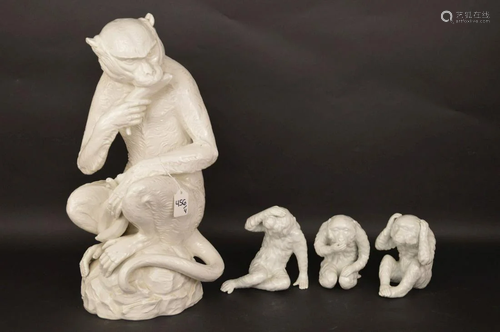 FOUR WHITE GLAZED CERAMIC MONKEY FIGURES - Group…