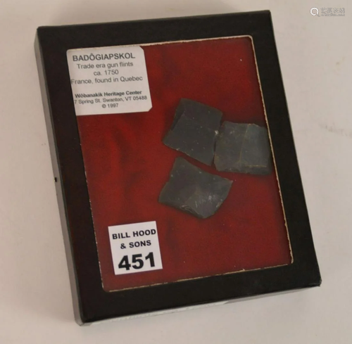 THREE 18TH CENTURY GUN FLINTS IN DISPLAY BOX - Three