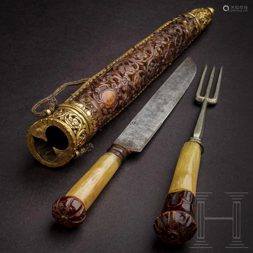 A distinguished set of German cutlery with amber knobs,