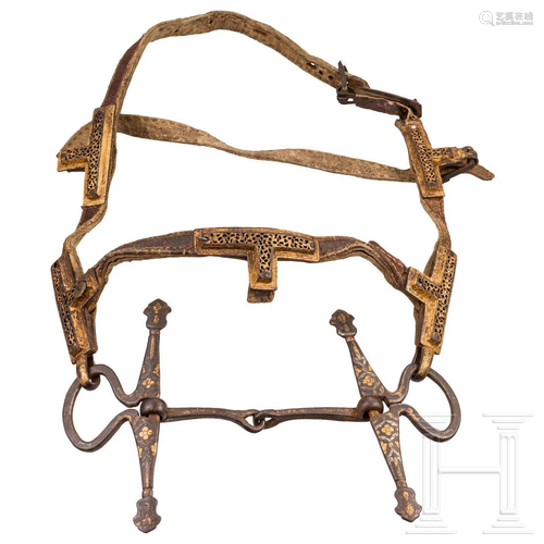 A chiselled Tibetan snaffle with silver and gold