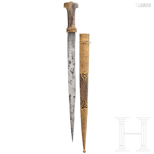 A long northern African dagger with rhino horn hilt,