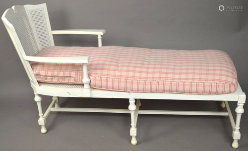 Painted white chaise lounge with caned back & seat,