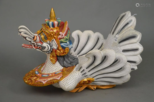 A Thai Painted Wood and Gesso Figure Of A Stylized