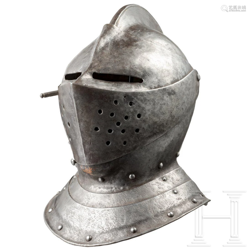 A heavy Flemish close helmet, circa 1600