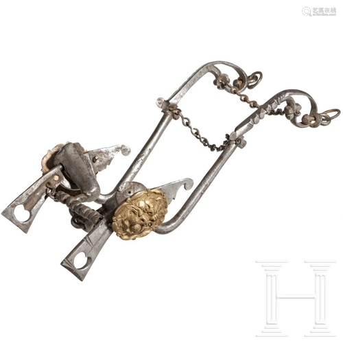 A French or Italian snaffle with gilt mascarons, 17th