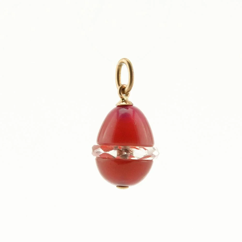 Pink celluloid or casein pendant Easter egg