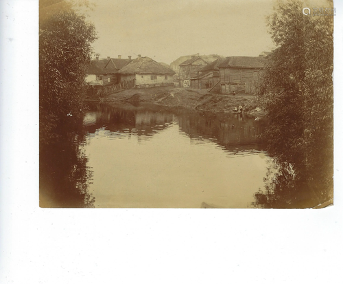 Photo of several wood cabins in Russian village