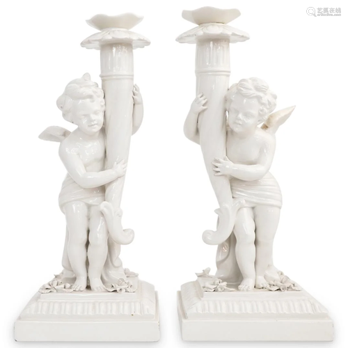 Pair of White Porcelain Cherub Candle Holders