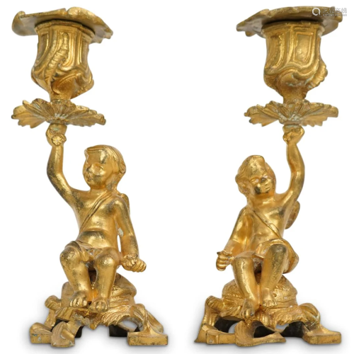 Pair of Bronze Cherub Candlesticks
