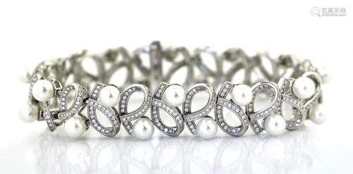 Eighteen Karat White Gold, Pearl and Diamond Bracelet