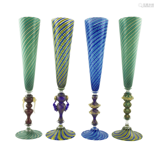 Set of four flute glasses in Murano glass